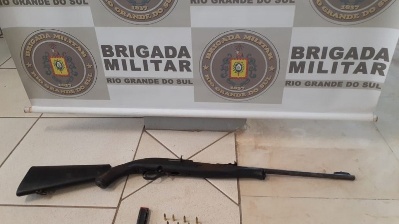 arma e munições apreendidas