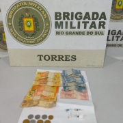 Banner da BM junto de dinheiro